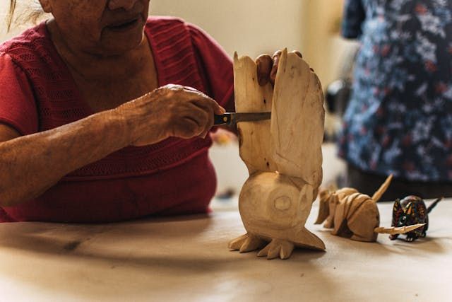 making a wood craft by curving